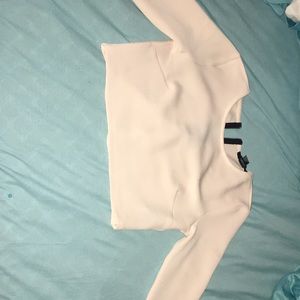 This is a baby pink tank top long sleeves